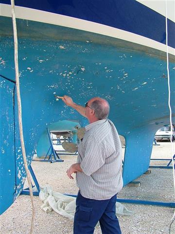 Marine yacht and boat surveyor at work